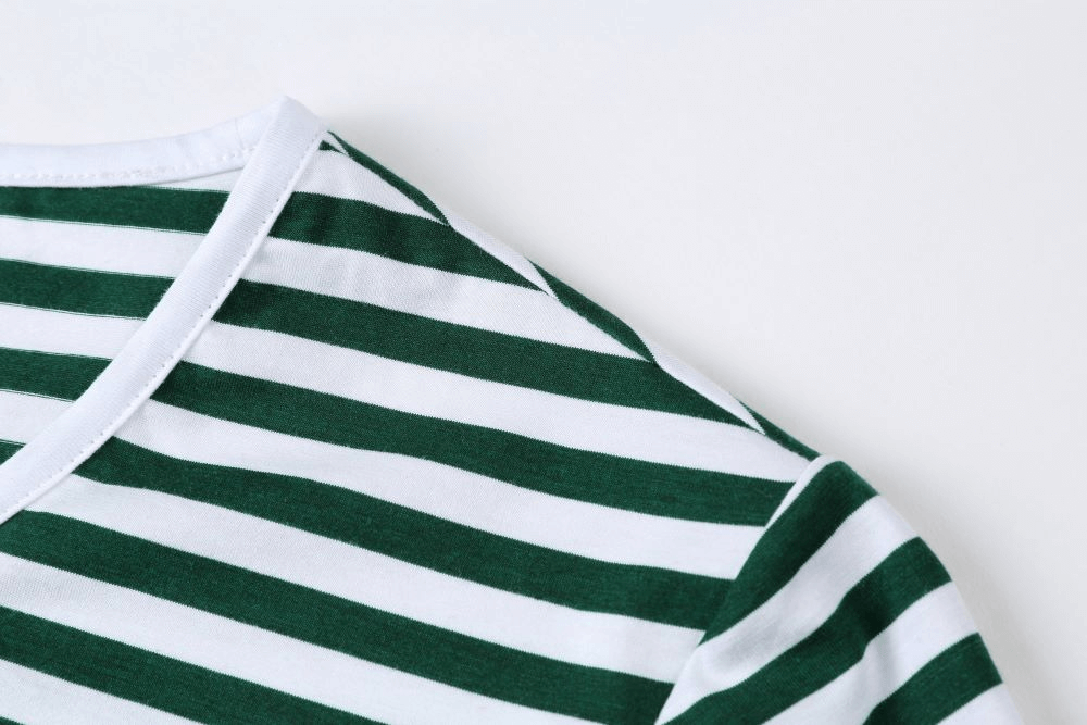 Close-up of stylish green and white striped V-neck tee with short sleeves for men, perfect for sports and casual wear.